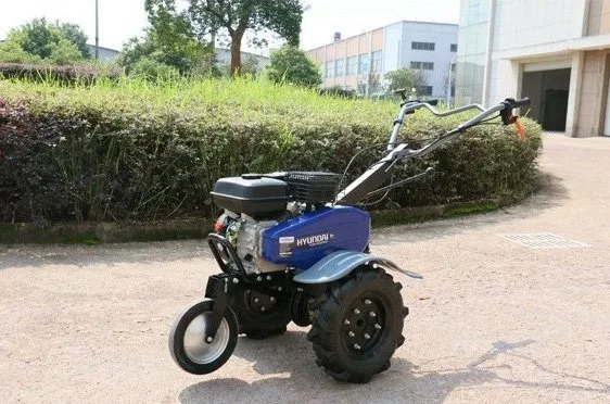 Motoculteur hyundai 6.5cv largeur 1 mètres avec charrue butoir, 6 fraises, roues - photo 2